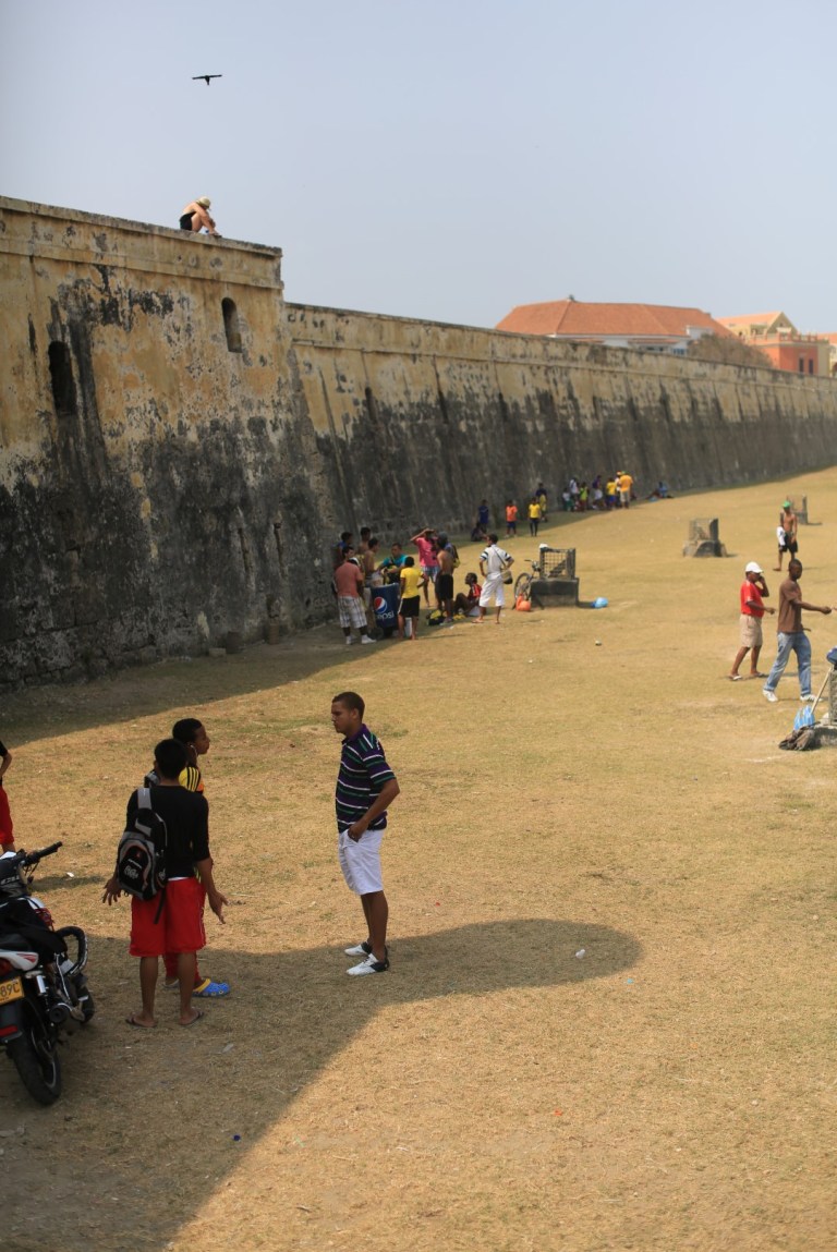 Watching Football From The Wall