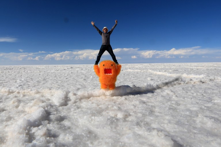 Mark being thrown up in a cheer by the orange domo