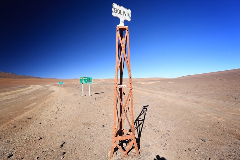 The border of Chile and Bolivia at the edge of the salar at around 13,000 feet above sea level.