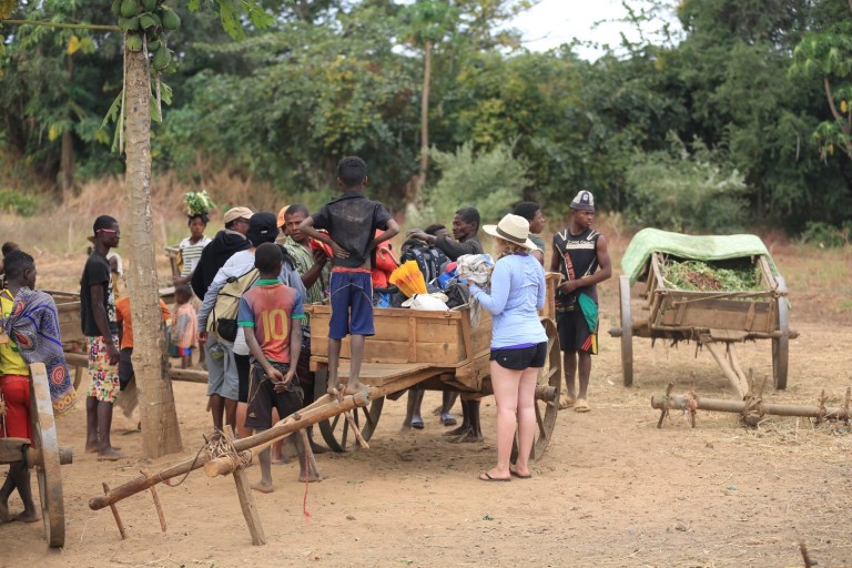 Helping us load into the zebu cart