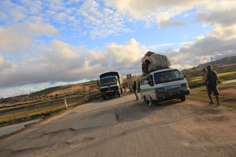 An average bridge on the RN7.  Truck, Taxi, pothole that will eat your car.