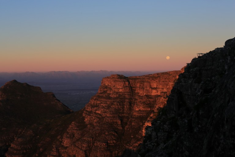 The moon rising over Cape Town