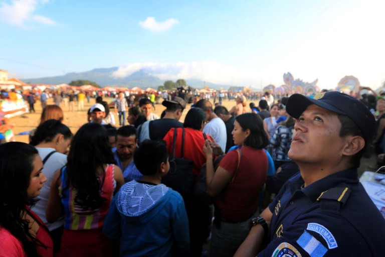 This cop is keeping his eyes peeled to see if something is coming down.