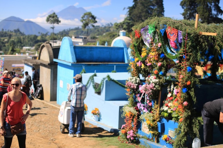 The scene at the cemetery is festive. We saw no tears, just people enjoying memories. Ice cream was available.